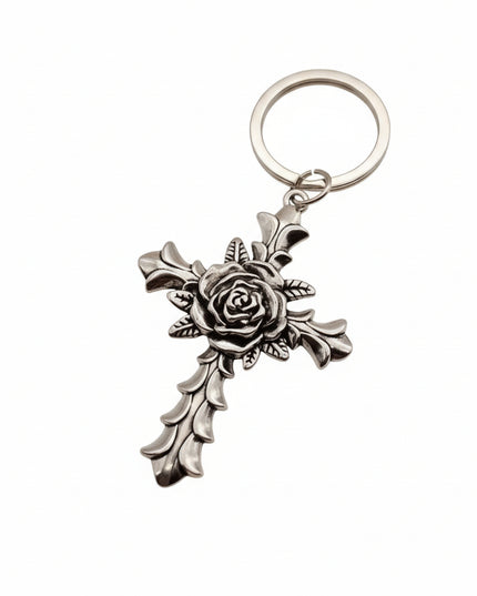 Silver keychain with cross charm covered with rose design