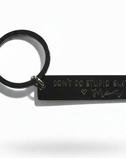 Black keychain with black charm etched with Don’t Do Stupid Shit - Mom