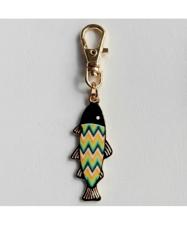 Keychain with Fish Shaped Charm with green, yellow, orange, pink, and black zigzag pattern