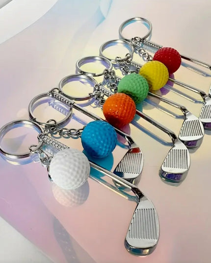 Keychain with golf club and ball charm in multiple colors