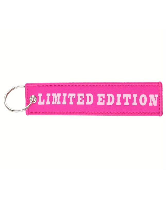 Embroidered keychain and tag that reads "Limited Edition"
