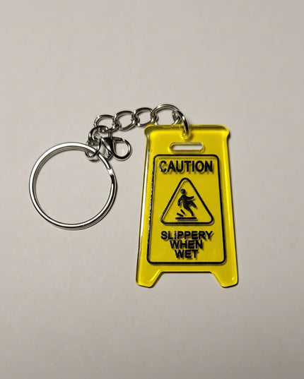 Caution Slippery When Wet Charm