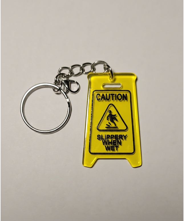 Caution Slippery When Wet Charm